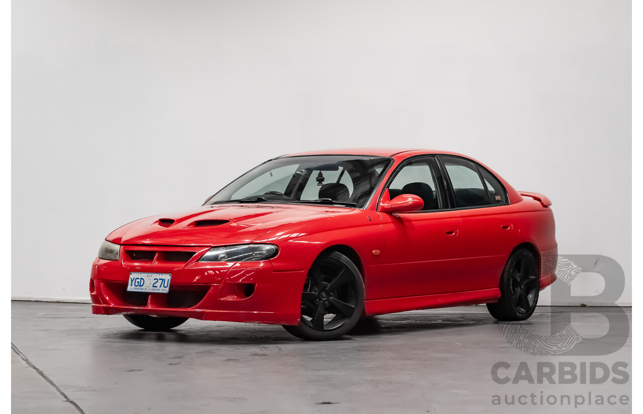 8/2002 Holden Commodore SS VXII 4d Sedan Red V8 5.7L