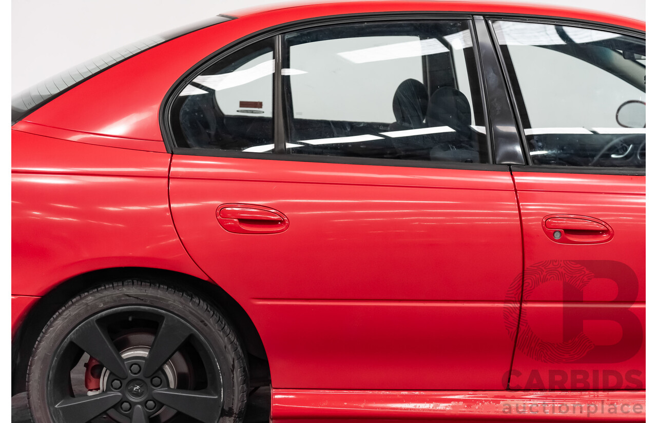 8/2002 Holden Commodore SS VXII 4d Sedan Red V8 5.7L