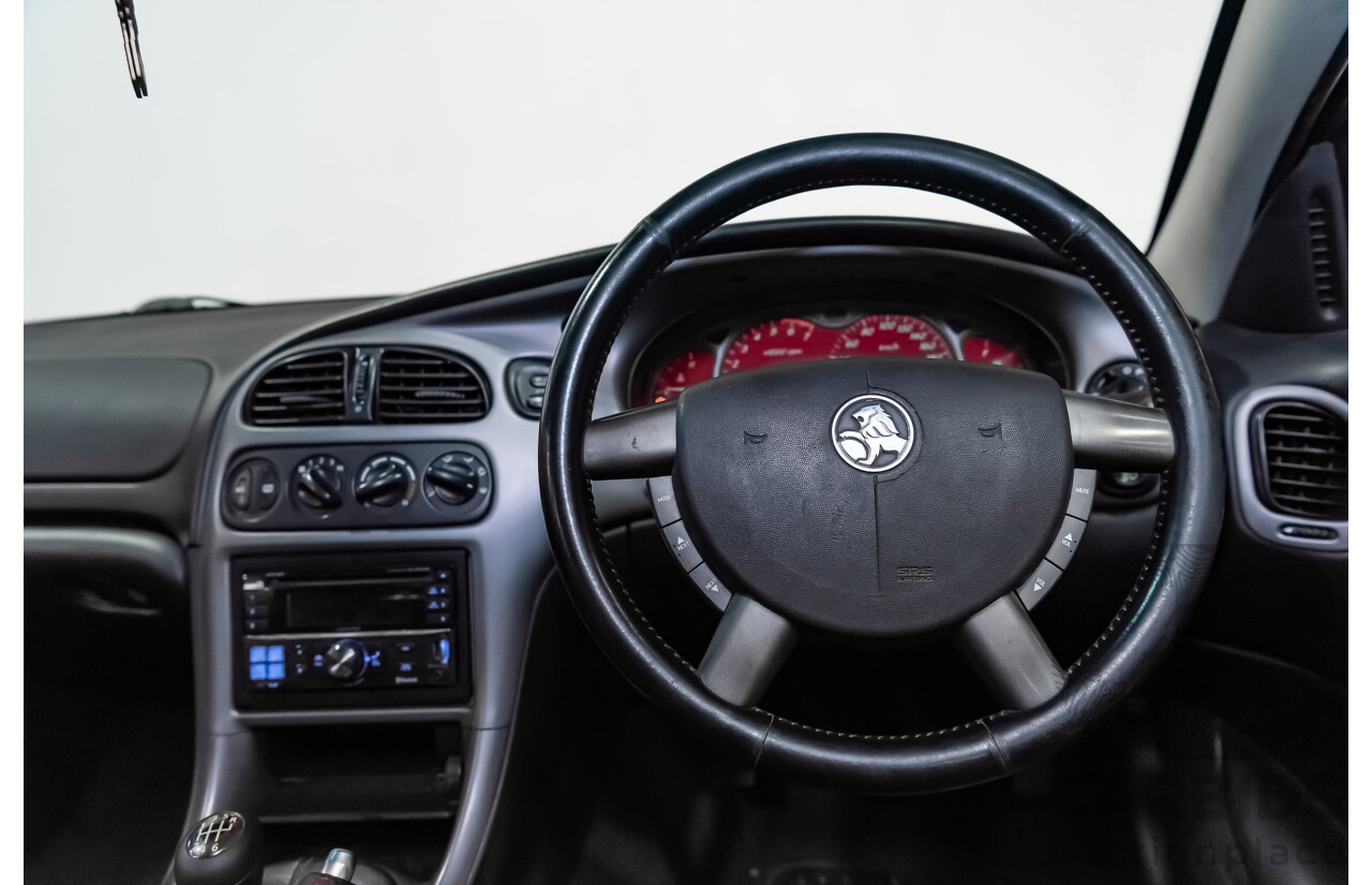 8/2002 Holden Commodore SS VXII 4d Sedan Red V8 5.7L