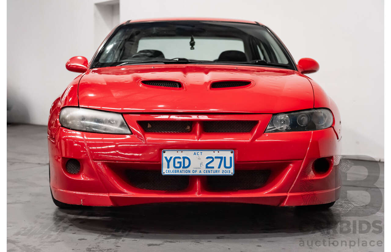 8/2002 Holden Commodore SS VXII 4d Sedan Red V8 5.7L