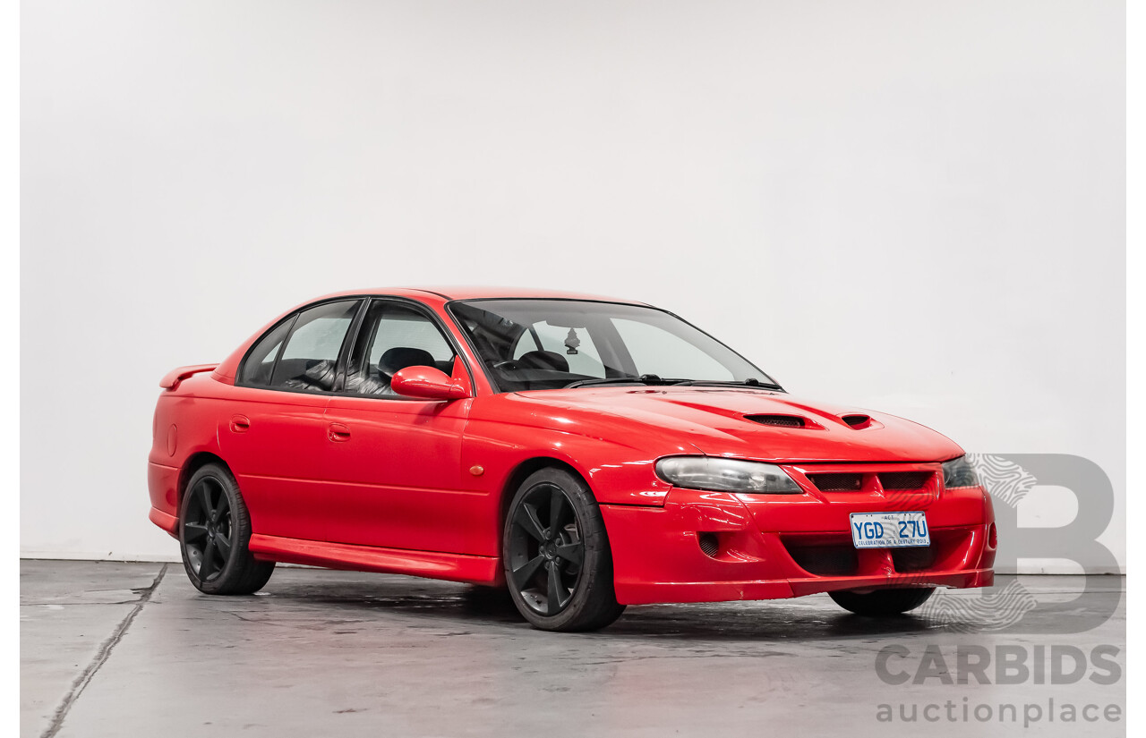 8/2002 Holden Commodore SS VXII 4d Sedan Red V8 5.7L