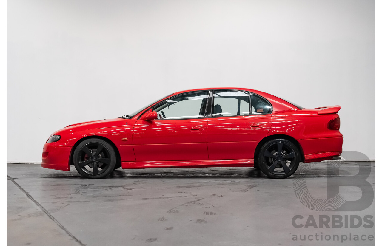 8/2002 Holden Commodore SS VXII 4d Sedan Red V8 5.7L