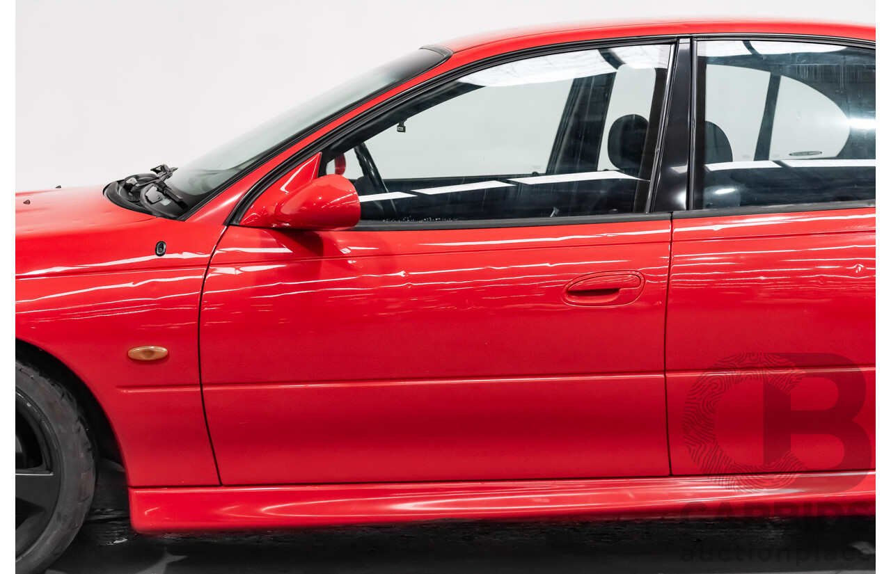 8/2002 Holden Commodore SS VXII 4d Sedan Red V8 5.7L