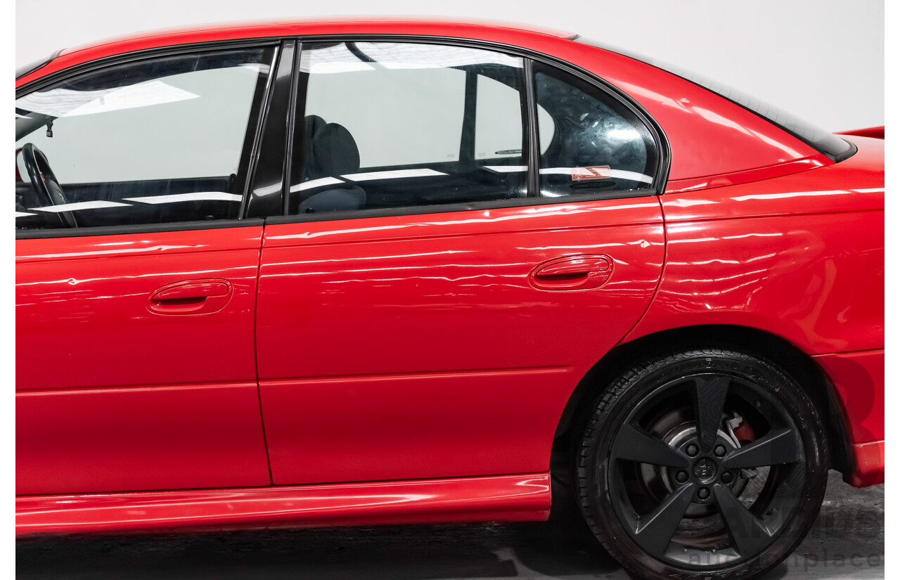 8/2002 Holden Commodore SS VXII 4d Sedan Red V8 5.7L