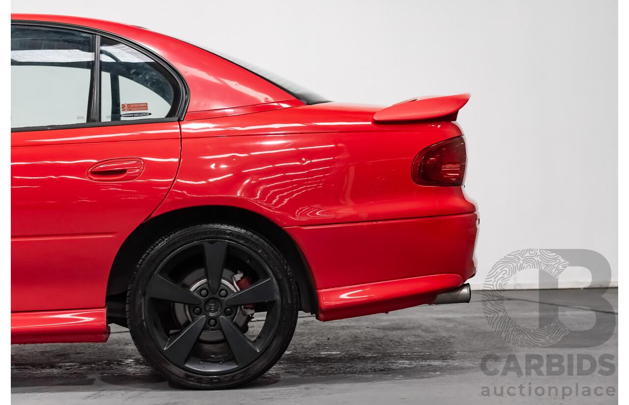 8/2002 Holden Commodore SS VXII 4d Sedan Red V8 5.7L