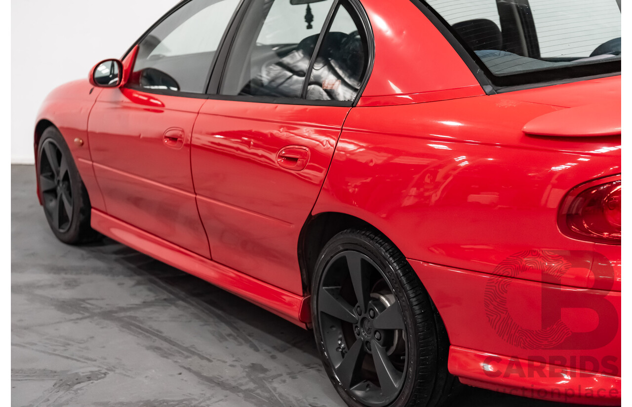 8/2002 Holden Commodore SS VXII 4d Sedan Red V8 5.7L