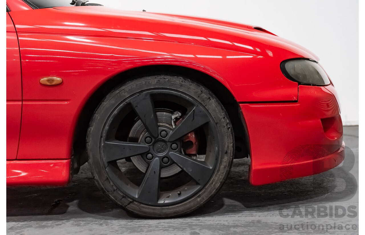 8/2002 Holden Commodore SS VXII 4d Sedan Red V8 5.7L