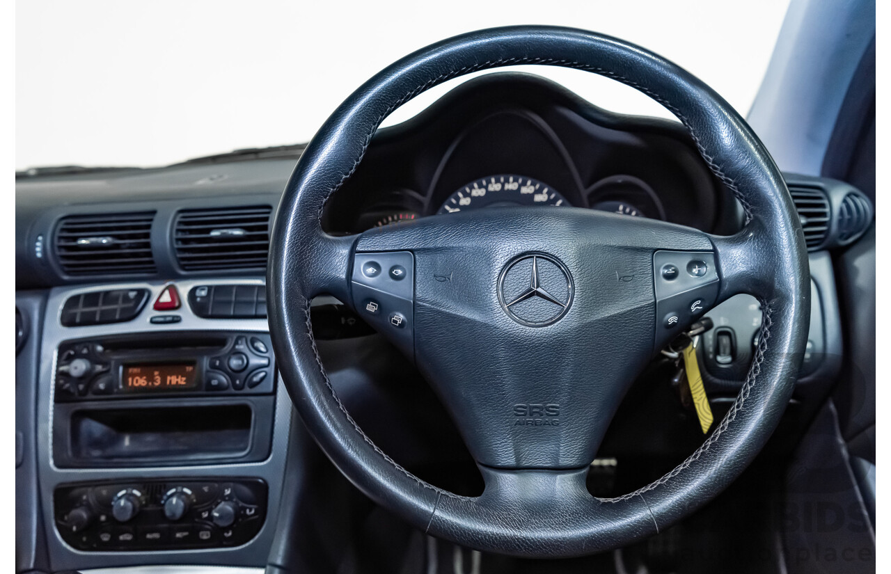 12/2002 Mercedes-Benz C200 Kompressor CL203 2d Coupe Obsidian Black Supercharged 1.8L