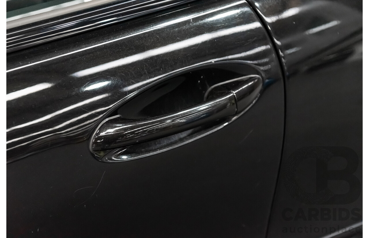 12/2002 Mercedes-Benz C200 Kompressor CL203 2d Coupe Obsidian Black Supercharged 1.8L