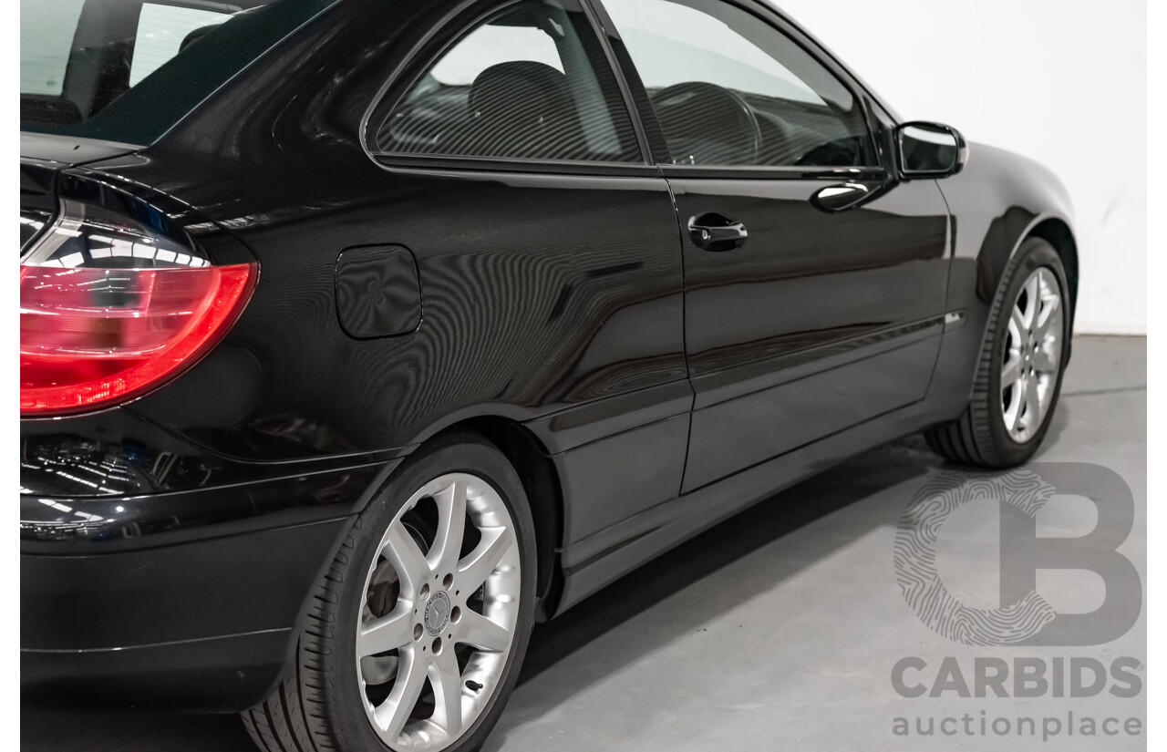 12/2002 Mercedes-Benz C200 Kompressor CL203 2d Coupe Obsidian Black Supercharged 1.8L