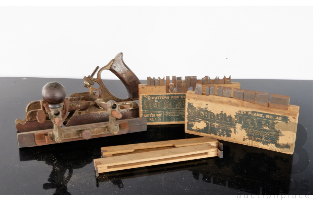 A Vintage Stanley No.45 Combination Plane with Two Boxes of Cutters