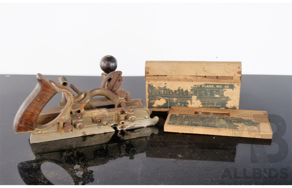 A Vintage Stanley No.45 Combination Plane with Two Boxes of Cutters