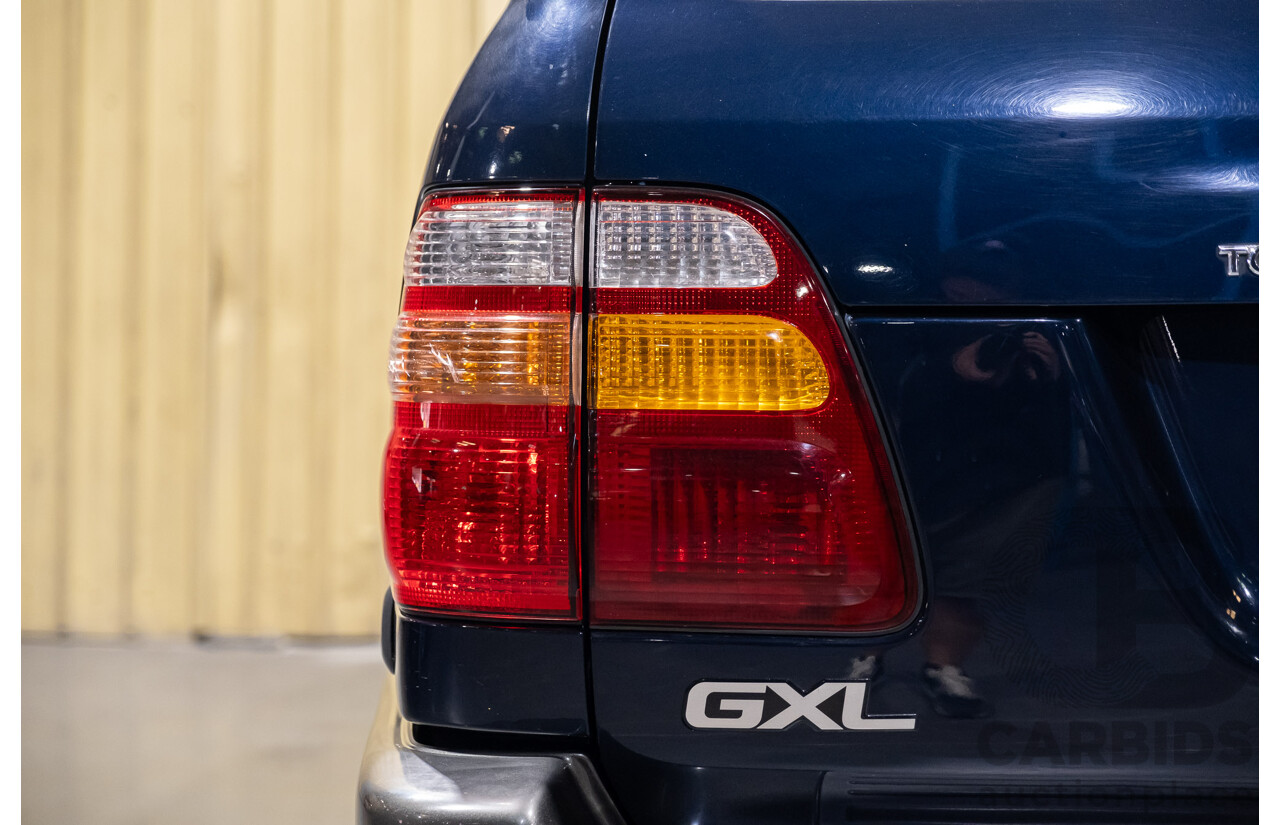 11/2001 Toyota Landcruiser GXL (4x4) FZJ105R 4d Wagon Blue Dual Fuel 4.5L - 8 Seater