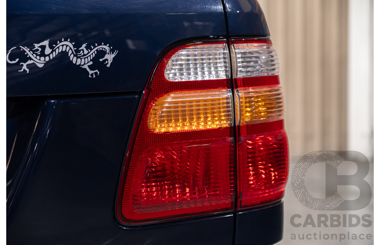 11/2001 Toyota Landcruiser GXL (4x4) FZJ105R 4d Wagon Blue Dual Fuel 4.5L - 8 Seater