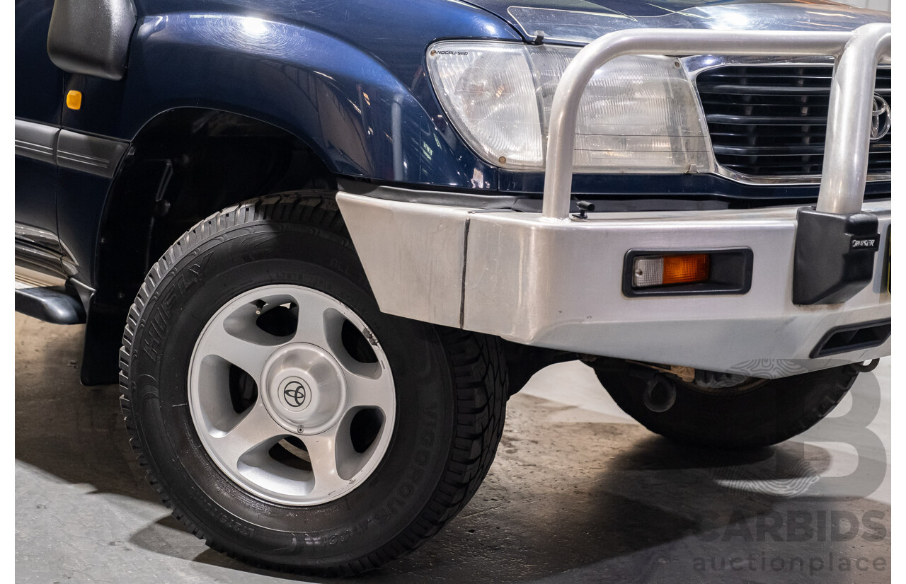 11/2001 Toyota Landcruiser GXL (4x4) FZJ105R 4d Wagon Blue Dual Fuel 4.5L - 8 Seater