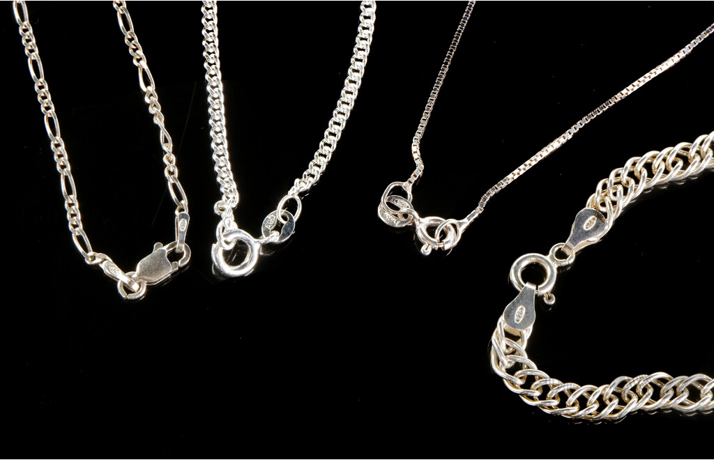 Four Sterling Silver Necklaces, Including Angus and Coote