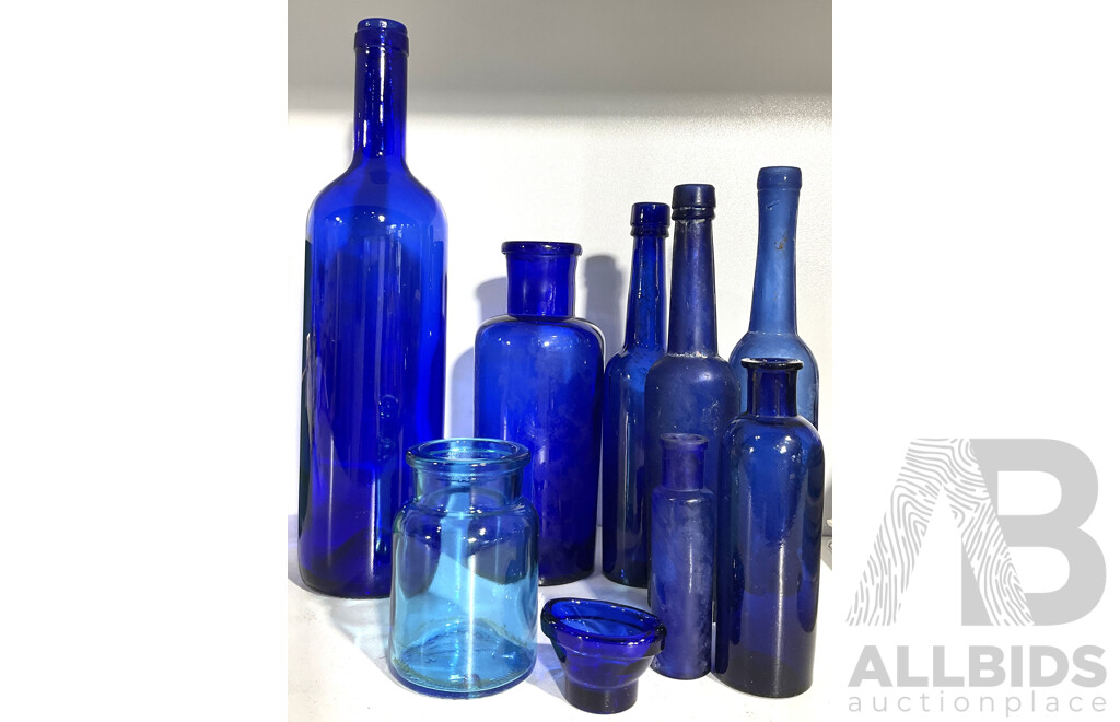 Collection Antique and Other Cobalt Blue Bottles