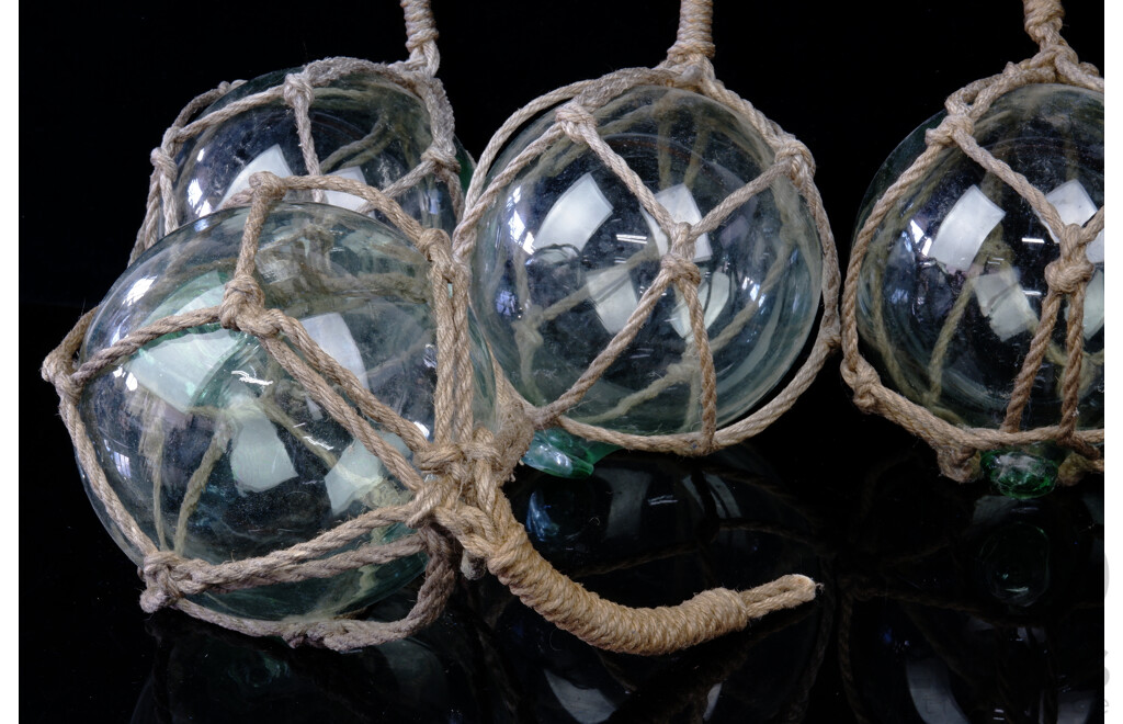 Four Good Glass and Rope Buoys