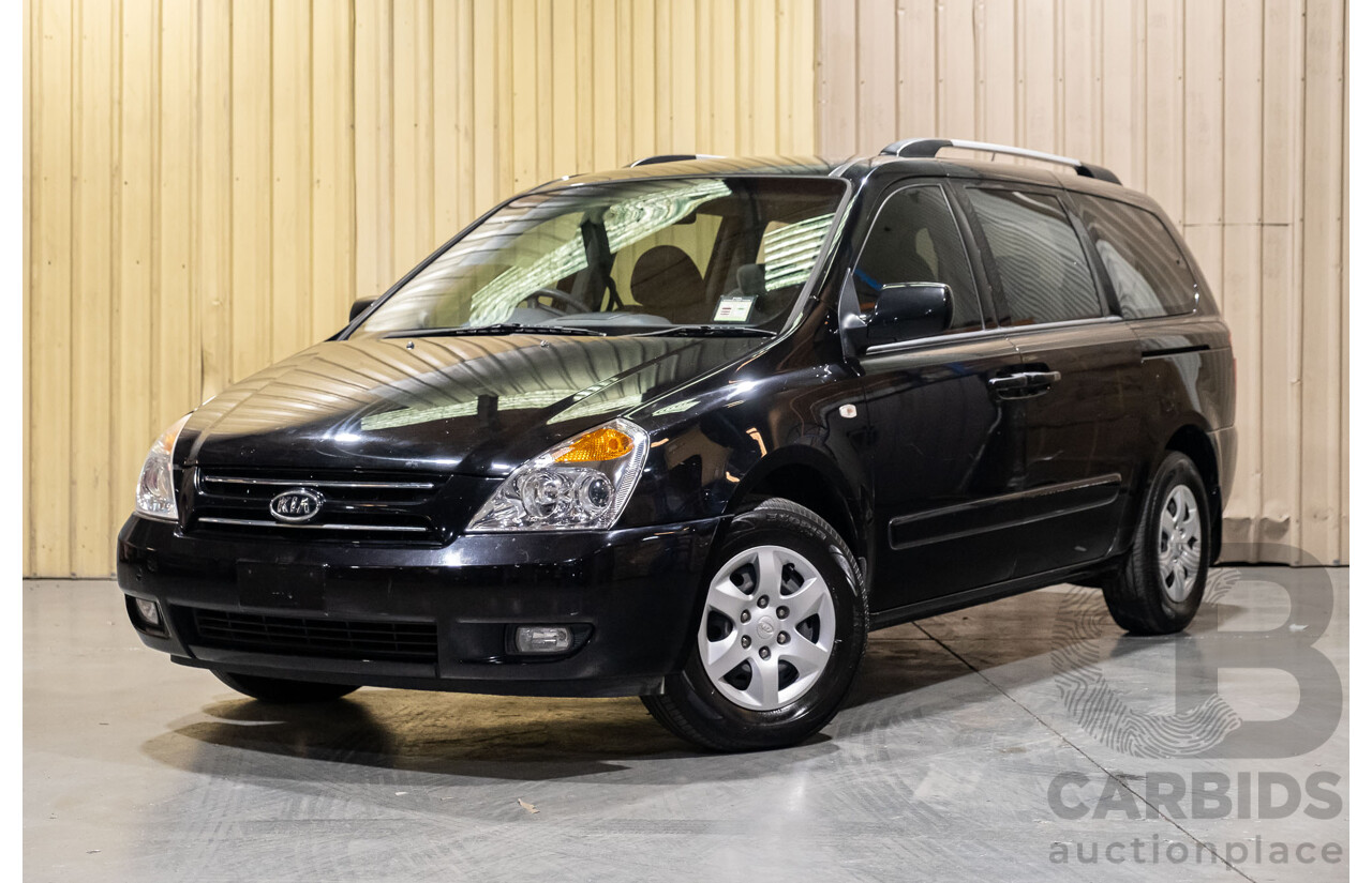 11/2009 Kia Grand Carnival (EX) VQ 4d Wagon Black V6 3.8L