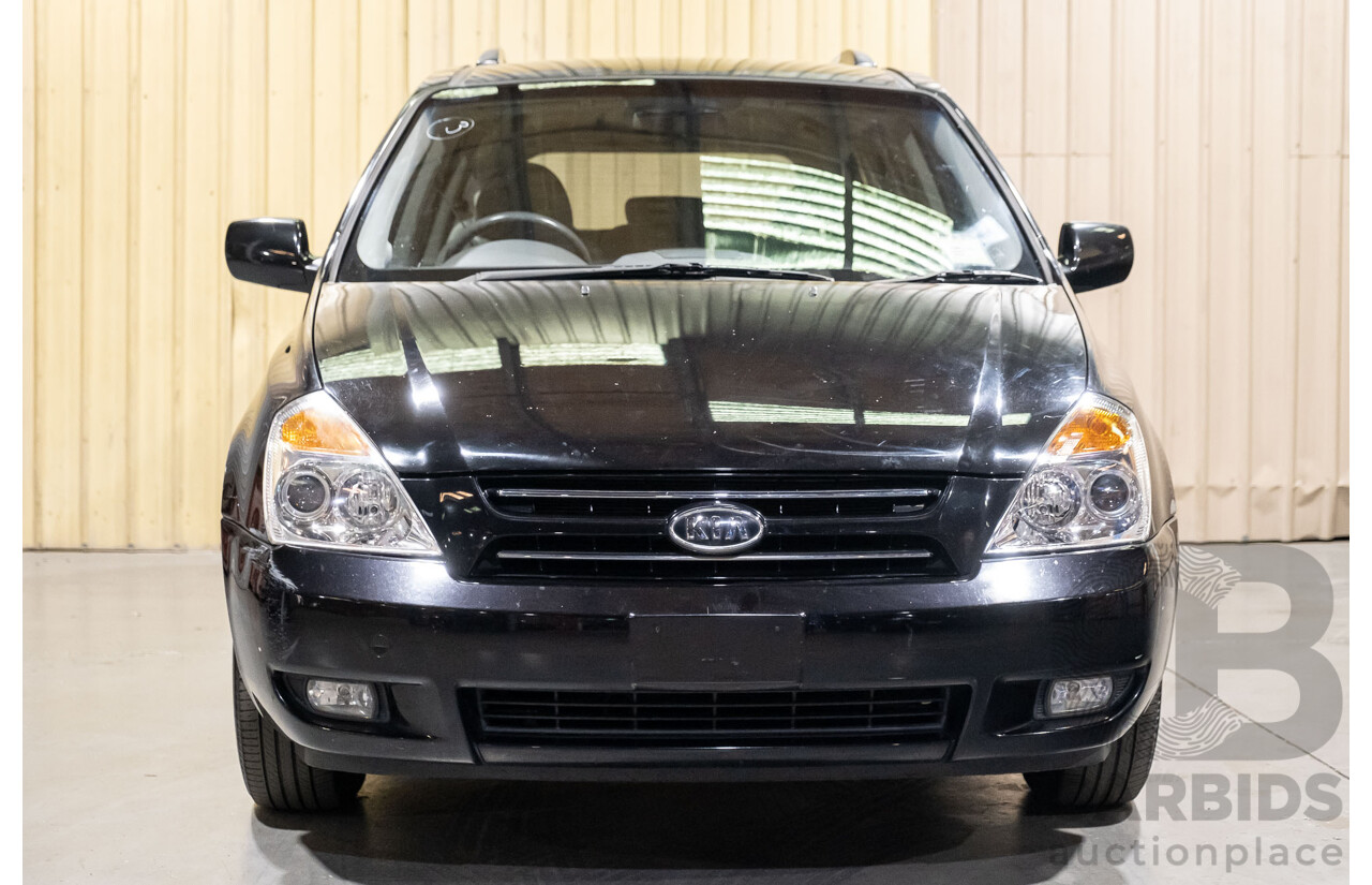 11/2009 Kia Grand Carnival (EX) VQ 4d Wagon Black V6 3.8L