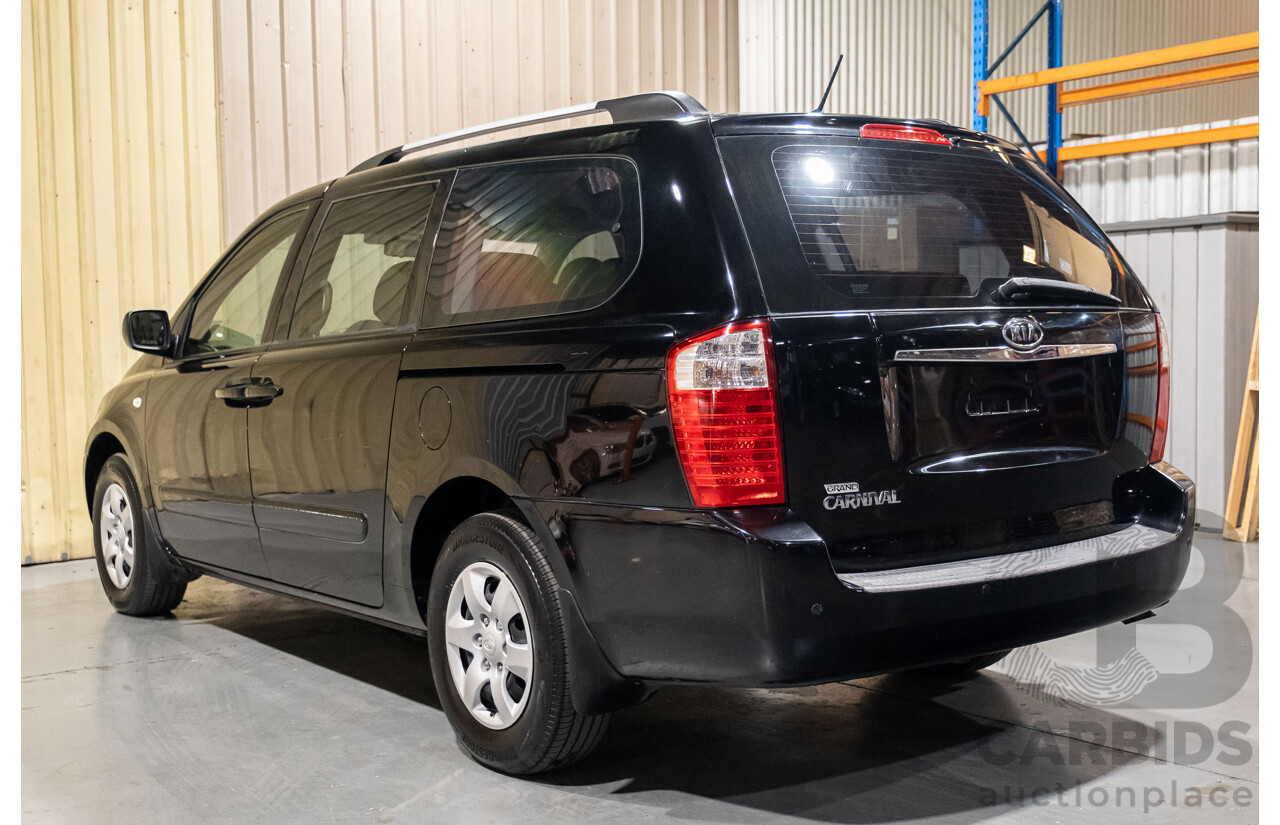 11/2009 Kia Grand Carnival (EX) VQ 4d Wagon Black V6 3.8L