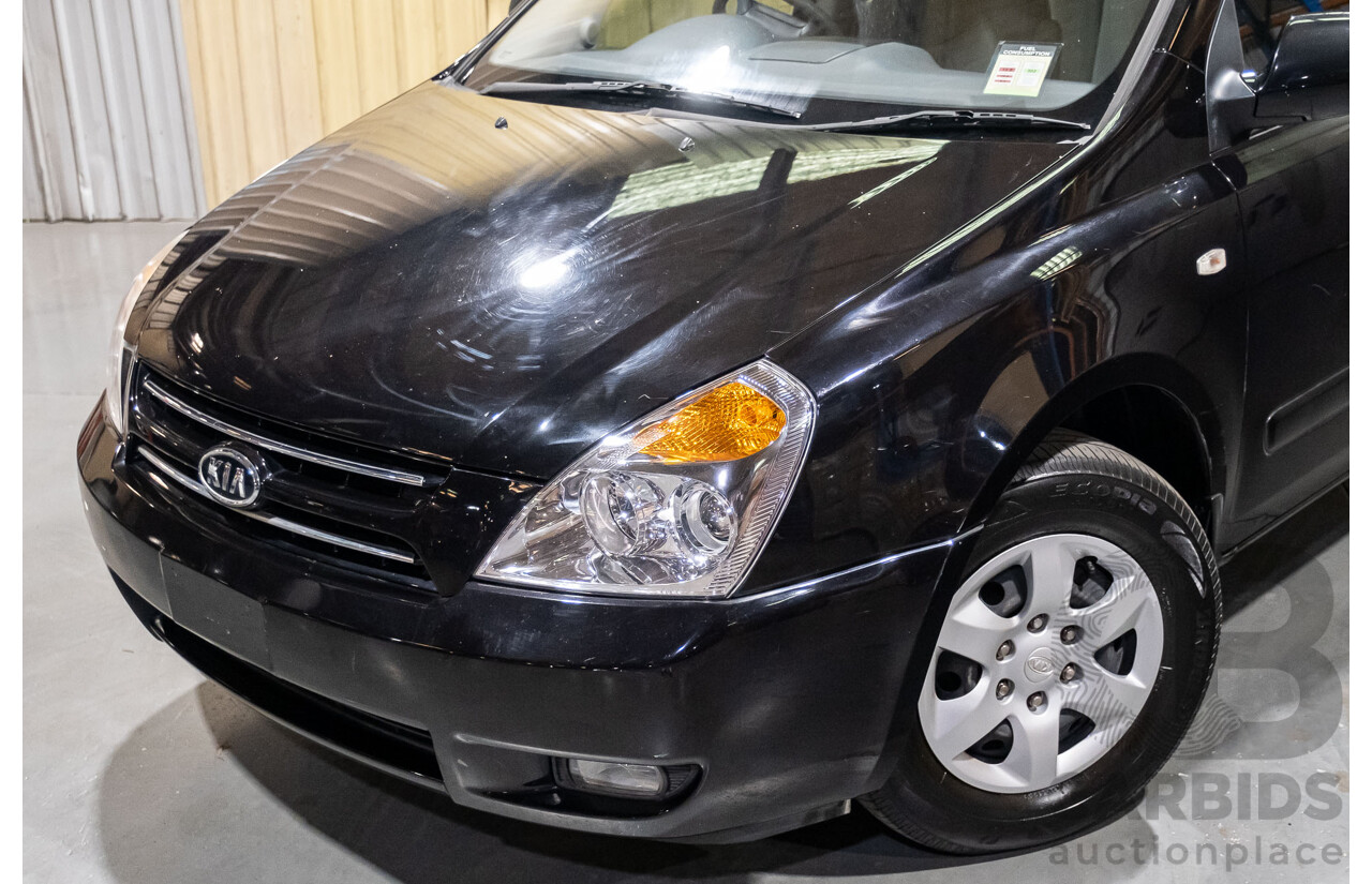 11/2009 Kia Grand Carnival (EX) VQ 4d Wagon Black V6 3.8L