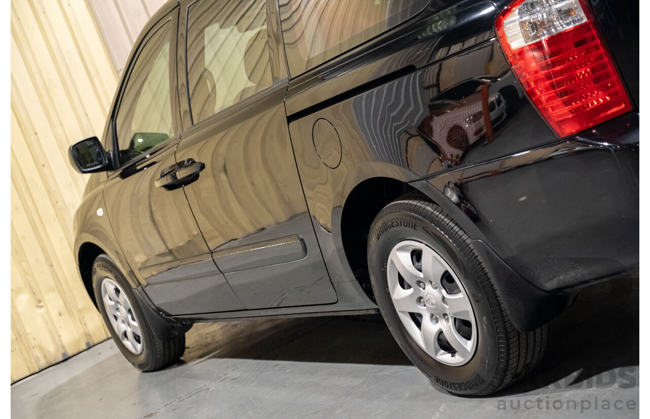 11/2009 Kia Grand Carnival (EX) VQ 4d Wagon Black V6 3.8L