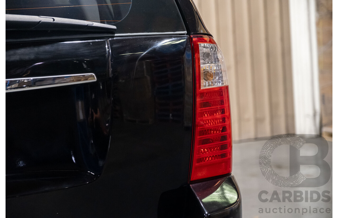 11/2009 Kia Grand Carnival (EX) VQ 4d Wagon Black V6 3.8L