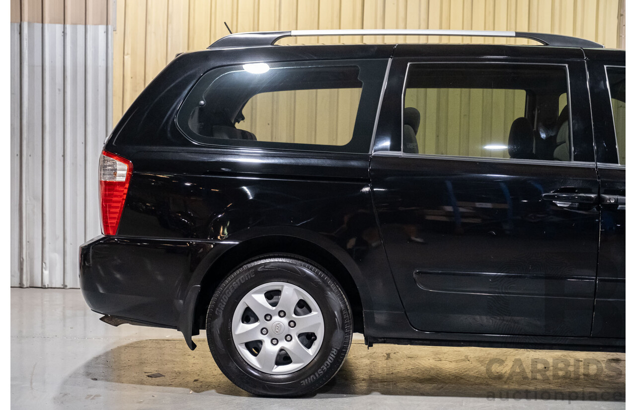 11/2009 Kia Grand Carnival (EX) VQ 4d Wagon Black V6 3.8L