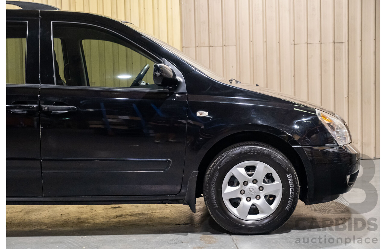 11/2009 Kia Grand Carnival (EX) VQ 4d Wagon Black V6 3.8L