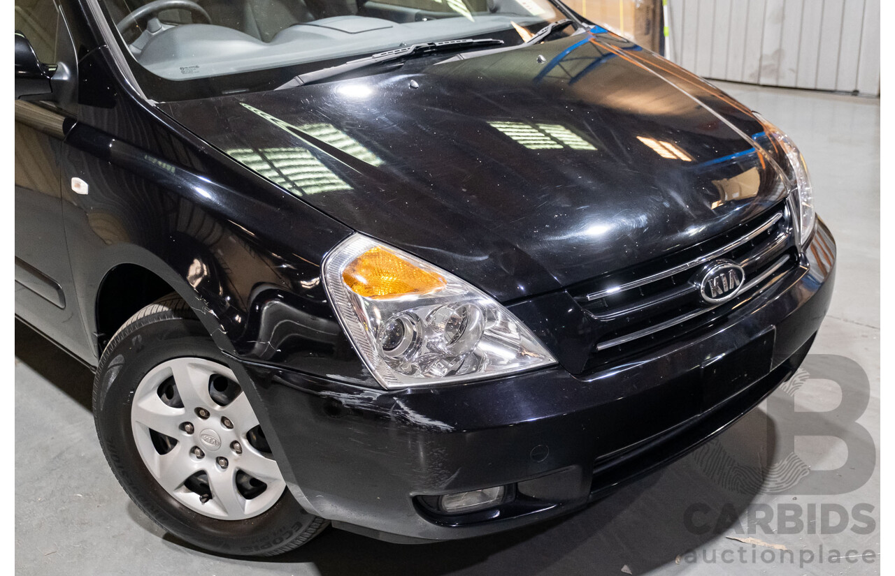 11/2009 Kia Grand Carnival (EX) VQ 4d Wagon Black V6 3.8L
