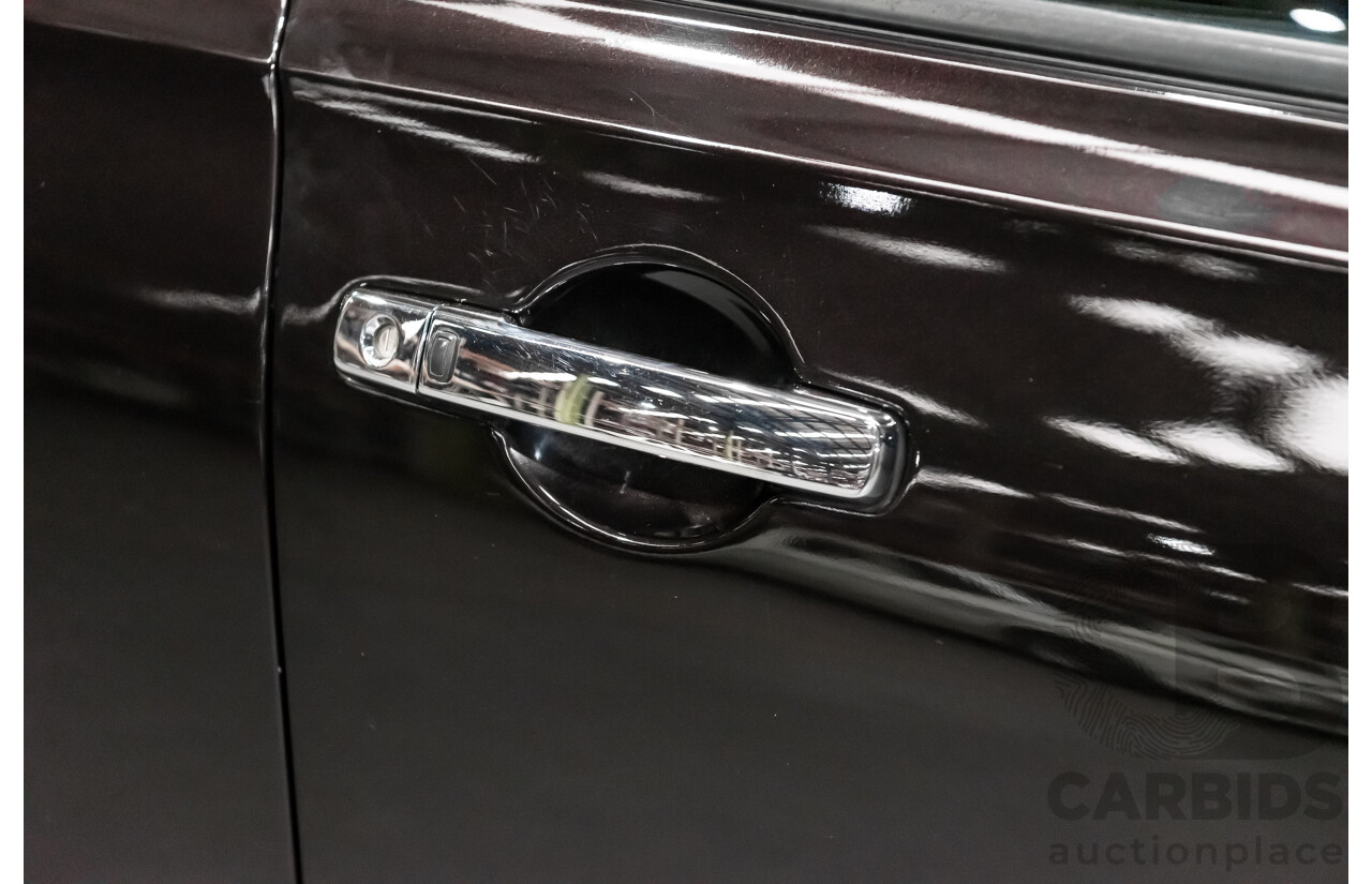 6/2014 Nissan Dualis +2 Ti-L (4x2) J10 MY13 4d Wagon Metallic Black 2.0L - 7 Seater
