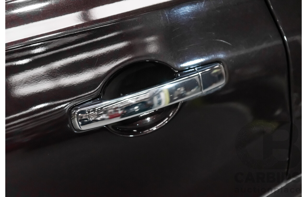 6/2014 Nissan Dualis +2 Ti-L (4x2) J10 MY13 4d Wagon Metallic Black 2.0L - 7 Seater