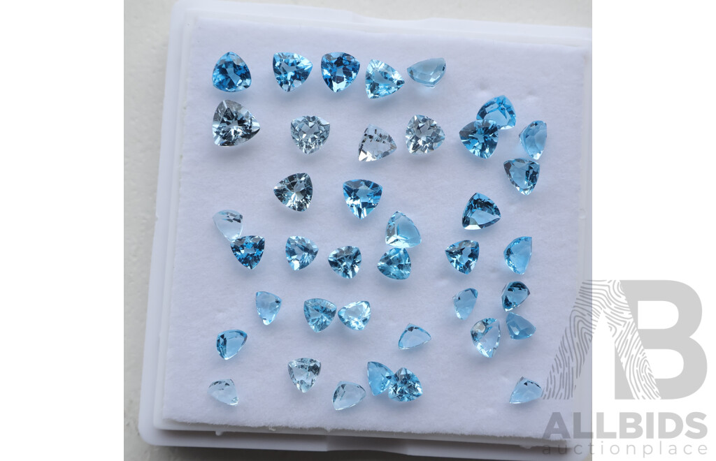 Topaz (39) Swiss to Pale Blue Unset Trilliant Cut Gemstones 1.0ct-0.60ct Each