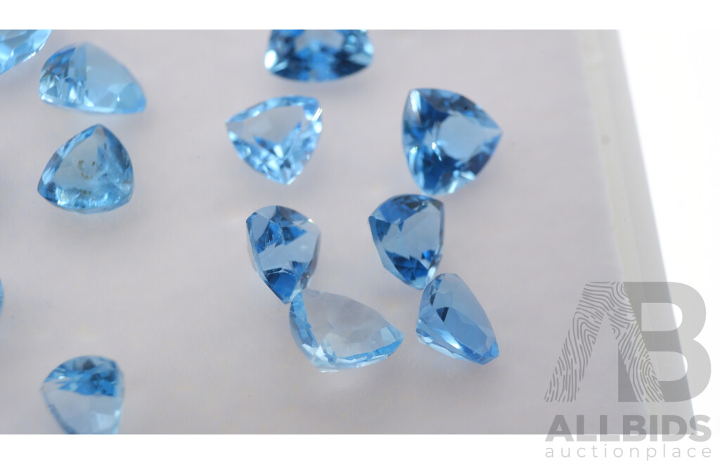 Topaz (39) Swiss to Pale Blue Unset Trilliant Cut Gemstones 1.0ct-0.60ct Each