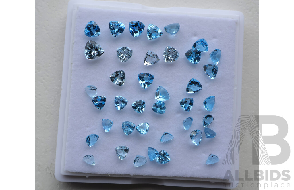 Topaz (39) Swiss to Pale Blue Unset Trilliant Cut Gemstones 1.0ct-0.60ct Each