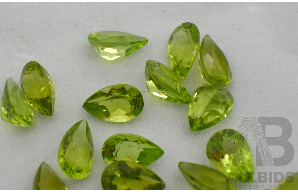 Peridot (22) Pear Cut Natural Untreated Unset Gemstones, 31.80ct