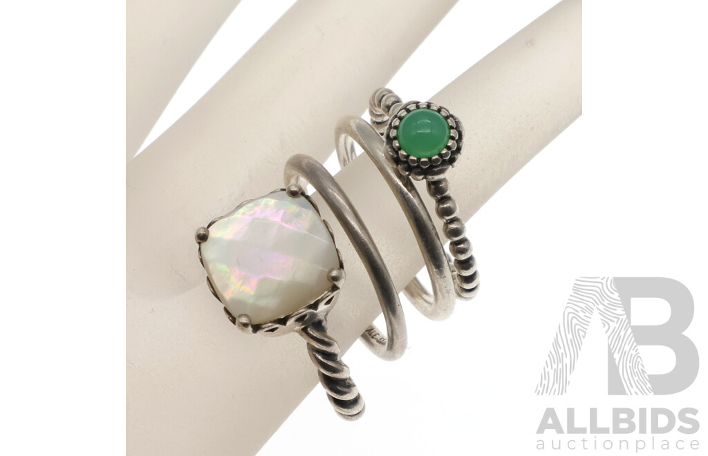 Collection of (4) Pandora Sterling Silver Rings, Including December Birthstone Ring and Mother of Pearl Ring, 14.03 Grams