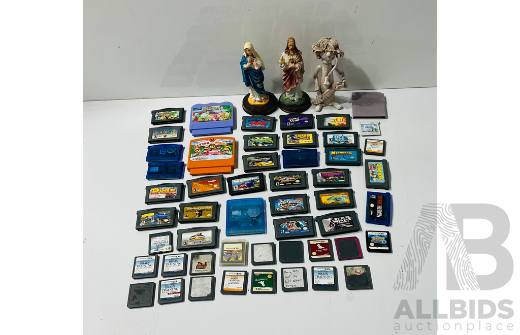 Collection of Retro Nintendo Games for the Gameboy Advance, Nintendo Ds and More with Three Statues