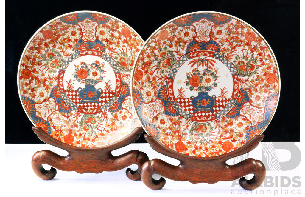 Impressive Pair Vintage Japanese Imari Chargers with Vase and Floral Decoration on Carved Wooden Display Stands Red Marks to Rear