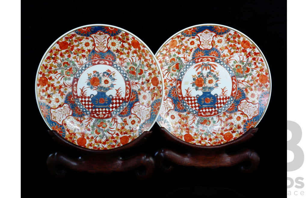 Impressive Pair Vintage Japanese Imari Chargers with Vase and Floral Decoration on Carved Wooden Display Stands Red Marks to Rear