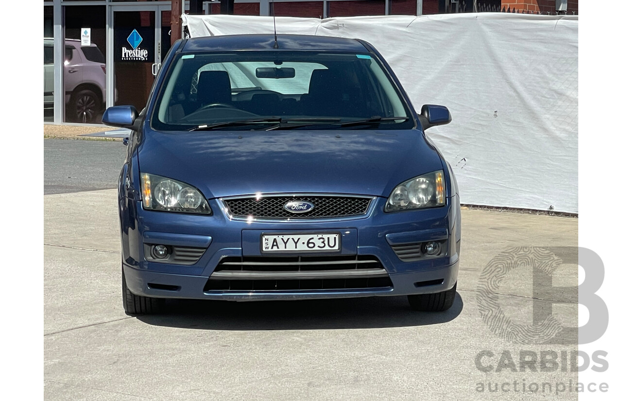 7/2006 Ford Focus Zetec LS 5d Hatchback Blue 2.0L