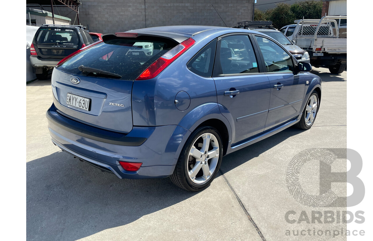 7/2006 Ford Focus Zetec LS 5d Hatchback Blue 2.0L