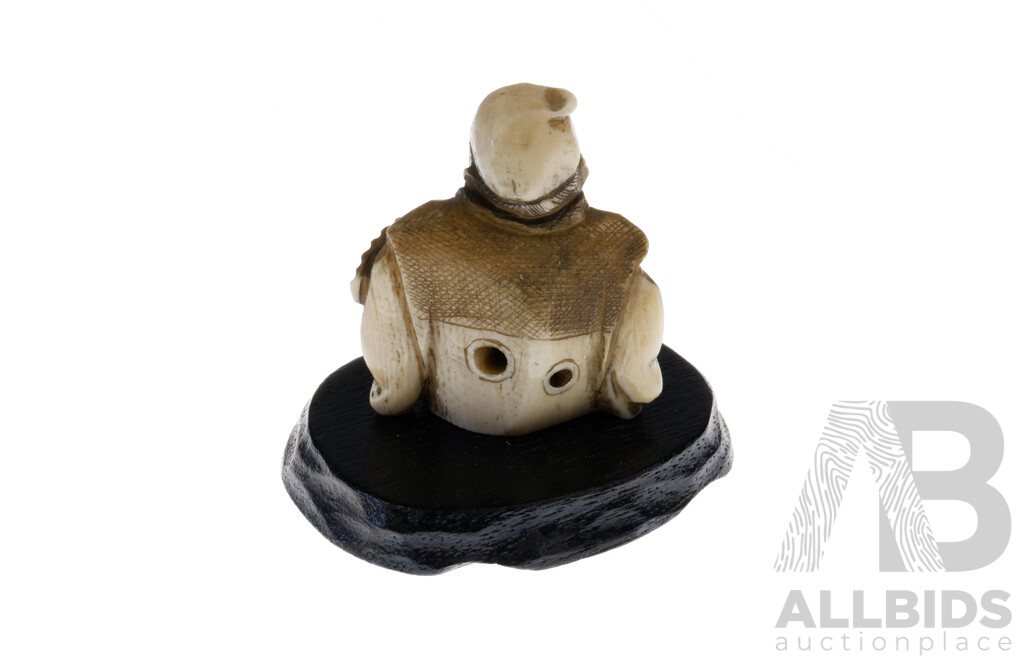 Antique Japanese Carved Ivory Netsuke of a Seated Figure with Fan