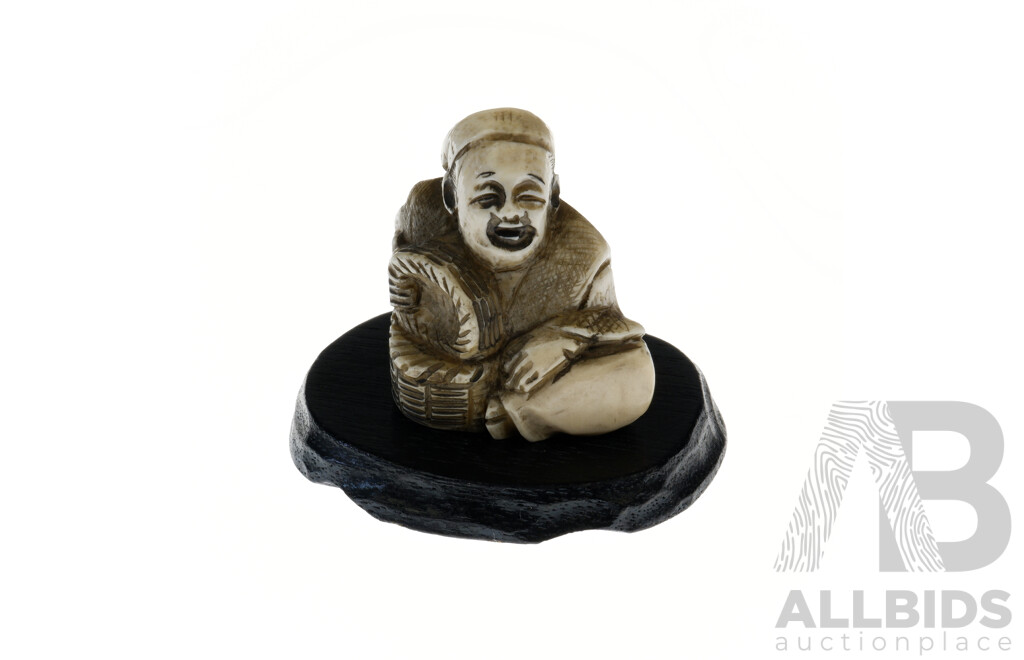 Antique Japanese Carved Ivory Netsuke of a Seated Figure with Basket