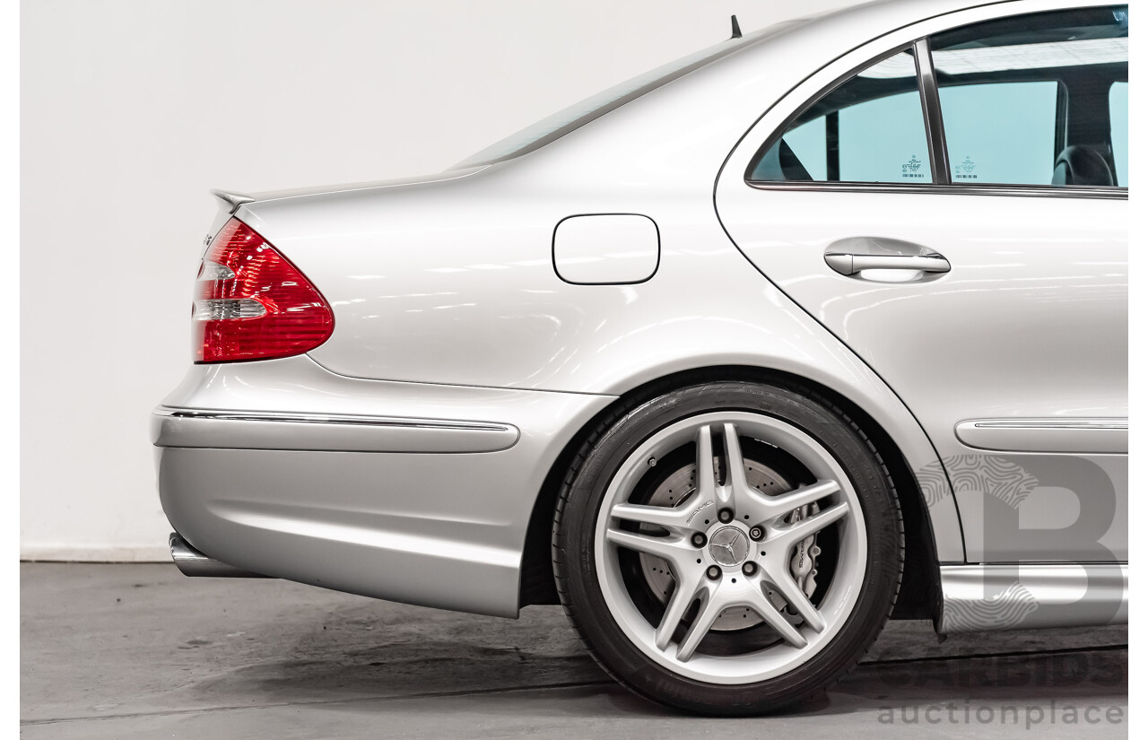 10/2004 Mercedes Benz E55 AMG W211 4d Sedan Brilliant Silver Metallic Supercharged V8 5.4L