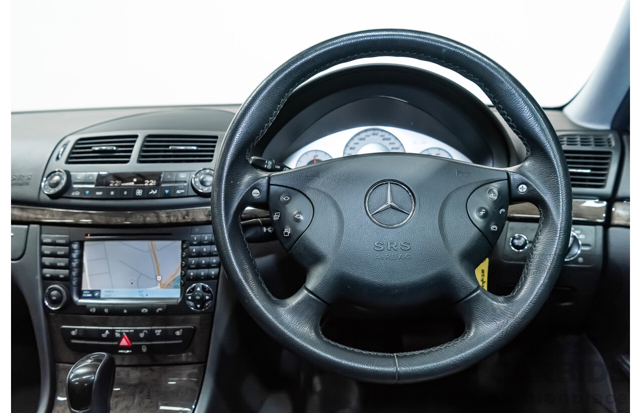 10/2004 Mercedes Benz E55 AMG W211 4d Sedan Brilliant Silver Metallic Supercharged V8 5.4L