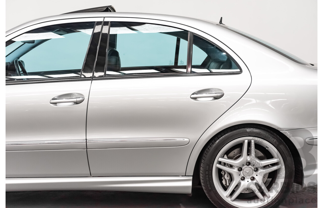 10/2004 Mercedes Benz E55 AMG W211 4d Sedan Brilliant Silver Metallic Supercharged V8 5.4L