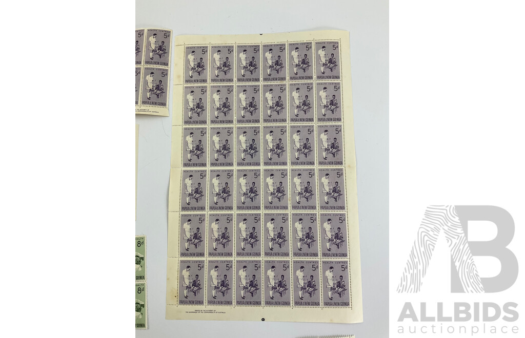 Papua New Guinea 1960's Stamp Sheet and Blocks Including 5d Health Centers and One Shilling Infant Child and Maternal Health, Printed by the Authority of the Government of the Commonwealth of Australia