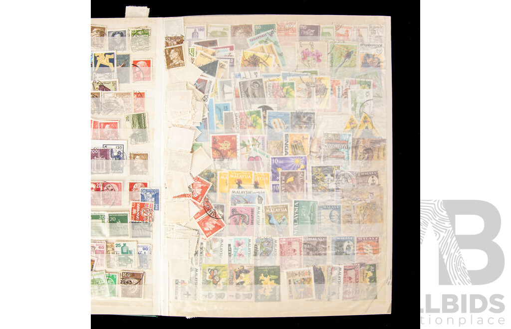 Album of Cancelled International Stamps Including Malaya, Canada, Zimbabwe, Germany, Philippines, Fiji, Italy, Poland, South Africa and More